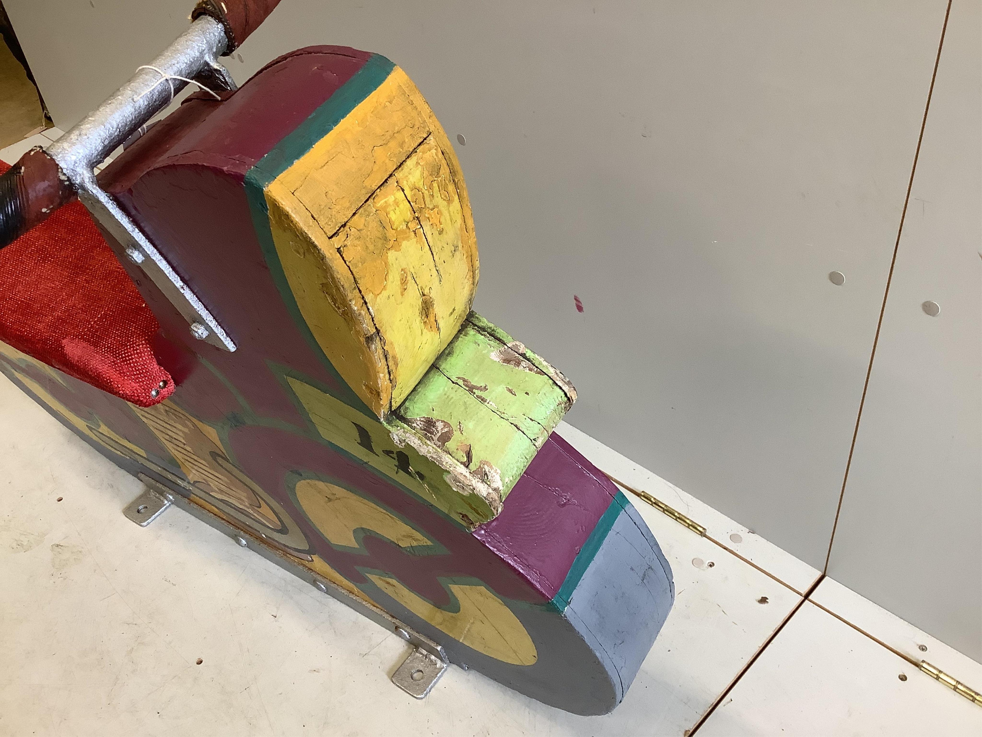 A mid 20th century carved painted wood fairground 
